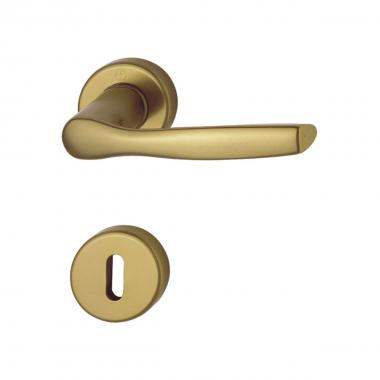 Maniglia in alliuminio ottonato c/rosetta tipo gabry