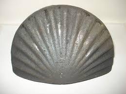 BATTICANCELLO IN GHISA CONCHIGLIA cm. 18